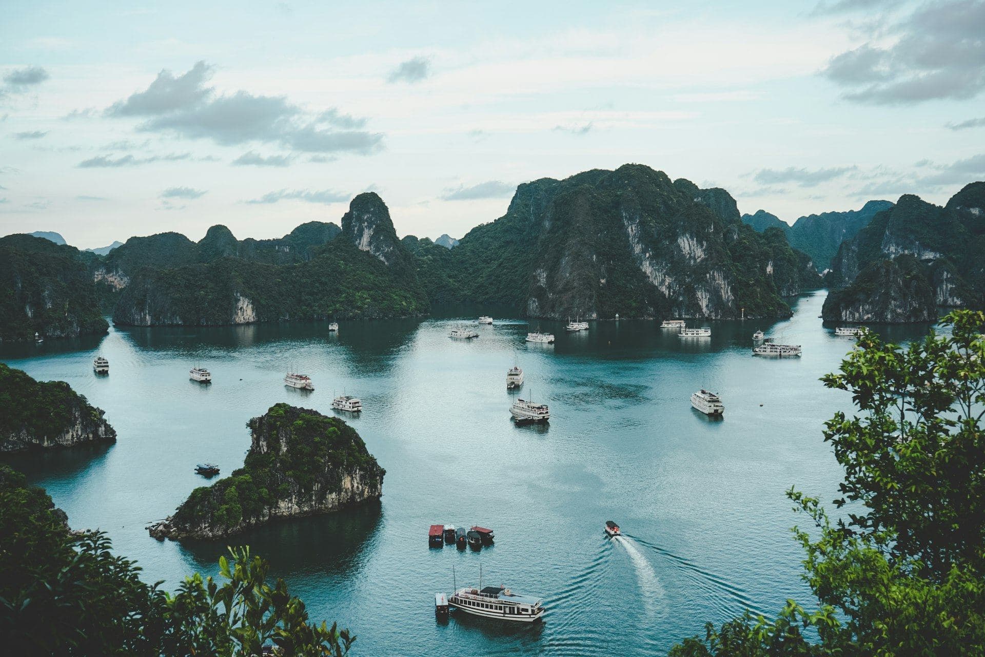 Limestone karsts and cruise boats in Ha Long Bay, Vietnam